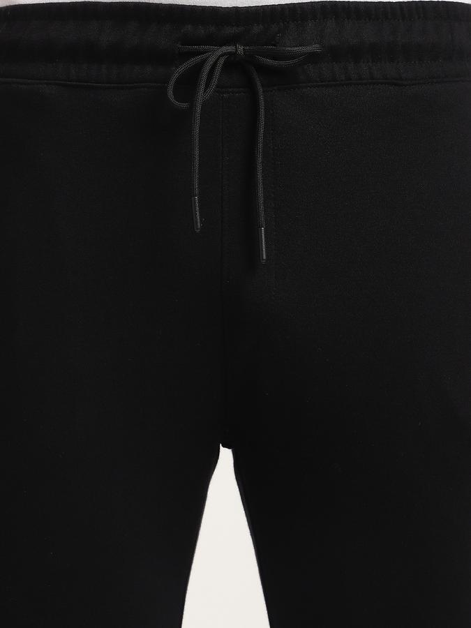 Men Cotton Blend Regular Fit Drawstring Cuffed Solid Trousers