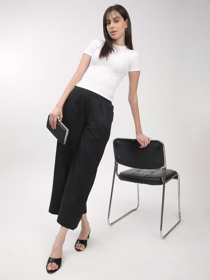 Women's black solid flared pallazo image number 1